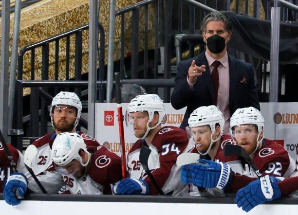 Head coach Jared Bednar of the Colorado Avalanche handles bench duties behind Kiefer Sherwood, Tyson Jost, Carl Soderberg, Nathan MacKinnon and...