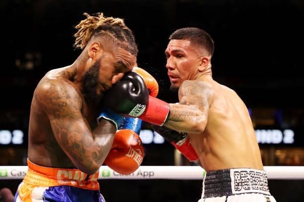 Luis Arias and Jarrett Hurd exchange blows during their junior middleweight boxing match at Hard Rock Stadium on June 06, 2021 in Miami Gardens,...