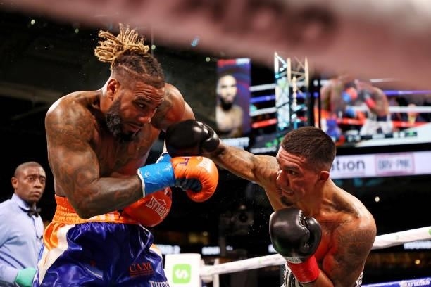 Luis Arias and Jarrett Hurd exchange blows during their junior middleweight boxing match at Hard Rock Stadium on June 06, 2021 in Miami Gardens,...
