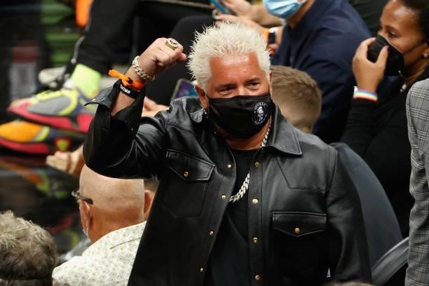 Television personality Guy Fieri attends Game One of the Western Conference second-round playoff series between the Phoenix Suns and the Denver...