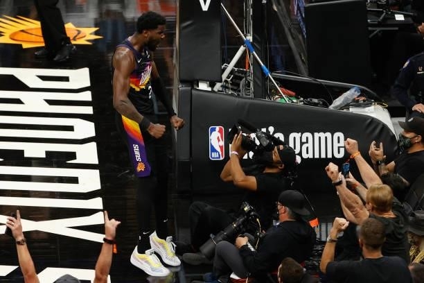Deandre Ayton of the Phoenix Suns celebrates after scoring and drawing a foul against the Denver Nuggets during the second half in Game One of the...