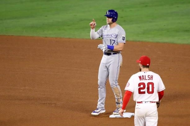 Hunter Dozier of the Kansas City Royals celebrates his double during the seventh inning against the Los Angeles Angels at Angel Stadium of Anaheim on...