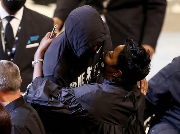 Kevin Durant of the Brooklyn Nets hugs his mother Wanda Durant after game two of the Eastern Conference second round series against the Milwaukee...