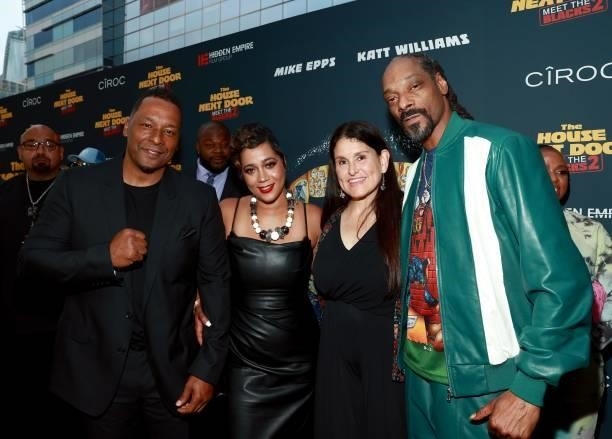 Deon Taylor, Roxanne Avent, Shannon McIntosh and Snoop Dogg attend the premiere of "The House Next Door: Meet The Blacks 2