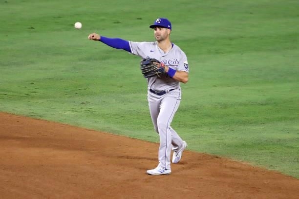 Whit Merrifield of the Kansas City Royals throws the ball to first base during the eighth inning against the Los Angeles Angels at Angel Stadium of...