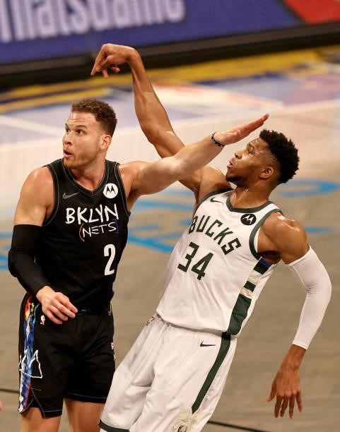 Giannis Antetokounmpo of the Milwaukee Bucks watches his shot as Blake Griffin of the Brooklyn Nets defends during game two of the Eastern Conference...