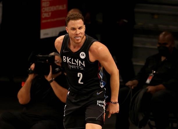 Blake Griffin of the Brooklyn Nets celebrates a dunk in the first quarter against the Milwaukee Bucks during game two of the Eastern Conference...