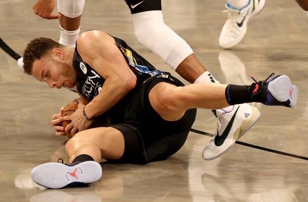Blake Griffin of the Brooklyn Nets grabs the loose ball in the first half against the Milwaukee Bucks during game two of the Eastern Conference...