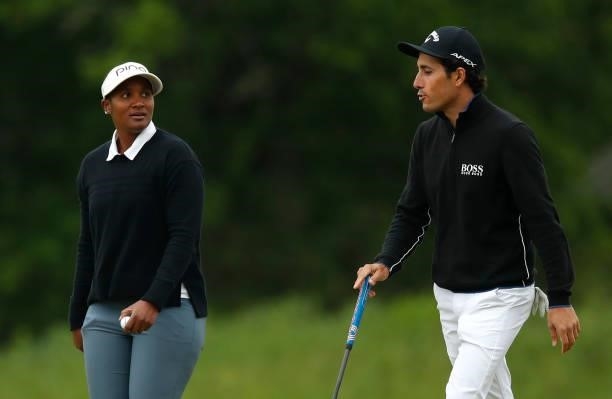 Carlos Pigem of Spain and Nobuhle Dlamini of South Africa interact during a practice round ahead of the Scandinavian Mixed Hosted by Henrik and...