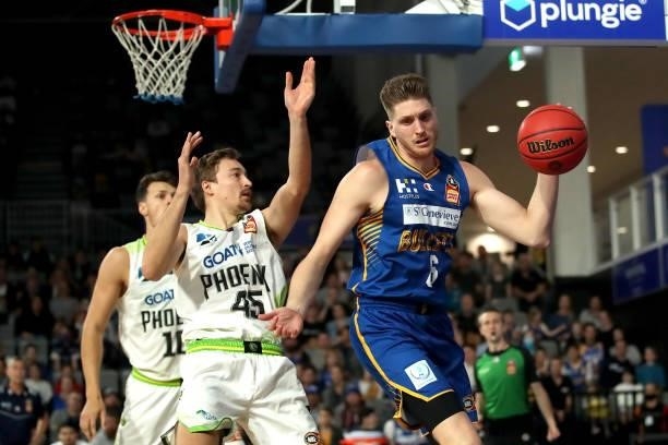 Matthew Hodgson of the Bullets rebounds the ball during the round 21 NBL match between the Brisbane Bullets and the South East Melbourne Phoenix at...