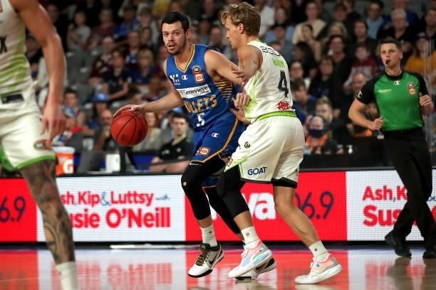 Jason Cadee of the Bullets handles the ball during the round 21 NBL match between the Brisbane Bullets and the South East Melbourne Phoenix at Nissan...