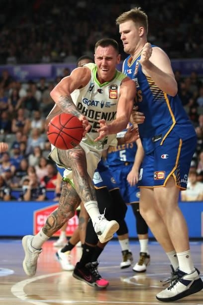 Mitch Creek of the Phoenix passes the ball during the round 21 NBL match between the Brisbane Bullets and the South East Melbourne Phoenix at Nissan...