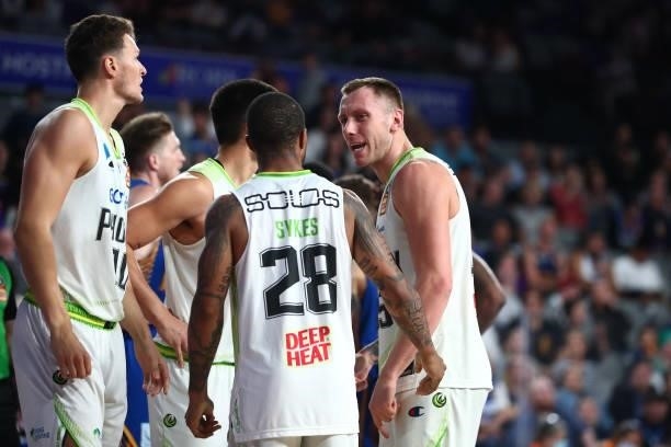Mitch Creek and the Phoenix huddle during the round 21 NBL match between the Brisbane Bullets and the South East Melbourne Phoenix at Nissan Arena,...