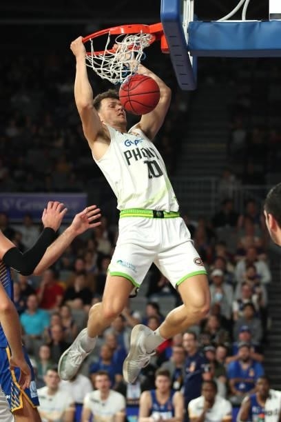 Yannick Wetzell of the Phoenix dunks the ball during the round 21 NBL match between the Brisbane Bullets and the South East Melbourne Phoenix at...