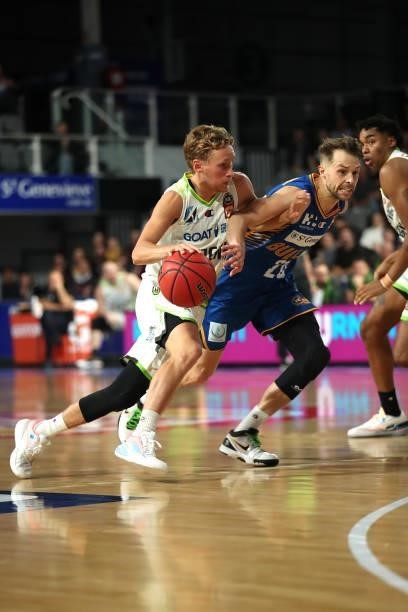 Kyle Adnam of the Phoenix handles the ball during the round 21 NBL match between the Brisbane Bullets and the South East Melbourne Phoenix at Nissan...