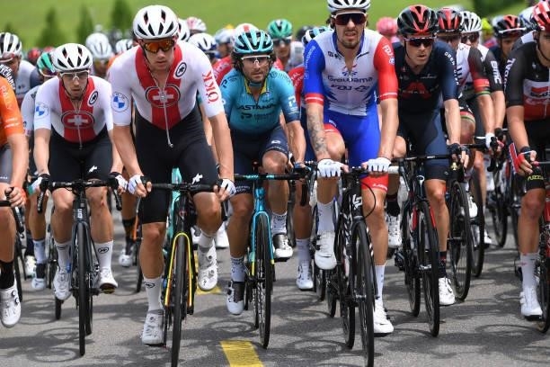Manuele Boaro of Italy and Team Astana – Premier Tech & Rohan Dennis of Australia and Team INEOS Grenadiers during the 84th Tour de Suisse 2021,...