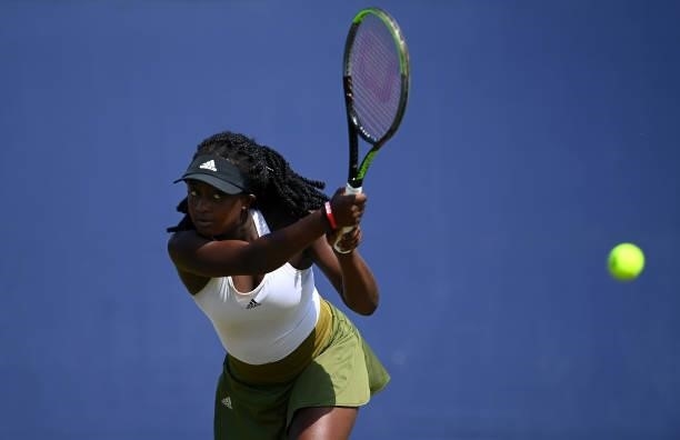 Hephzibah Oluwadare hits a backhand during her match against Alicia Dudeney during the Junior National Tennis Championships at Surbiton Racket &...