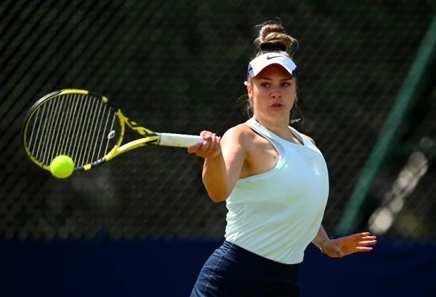 Eva Shaw hits a forehand during her match against Annabel Davis during the Junior National Tennis Championships at Surbiton Racket & Fitness Club on...