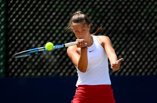 Annabel Davis hits a forehand during her match against Eva Shaw during the Junior National Tennis Championships at Surbiton Racket & Fitness Club on...