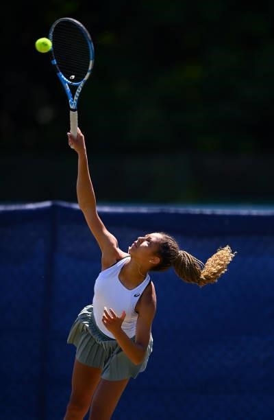 Ranah Akua Stoiber serves during her match against Millie Skelton during the Junior National Tennis Championships at Surbiton Racket & Fitness Club...