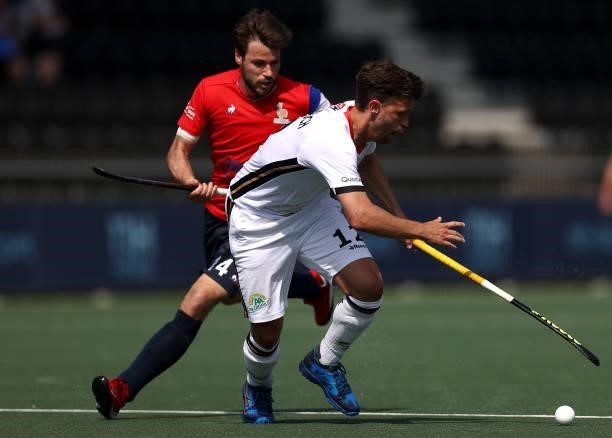 Timm Herzbruch of Germany battles for the ball with Gaspard Baumgarten of France during the Euro Hockey Championships Men match between France and...