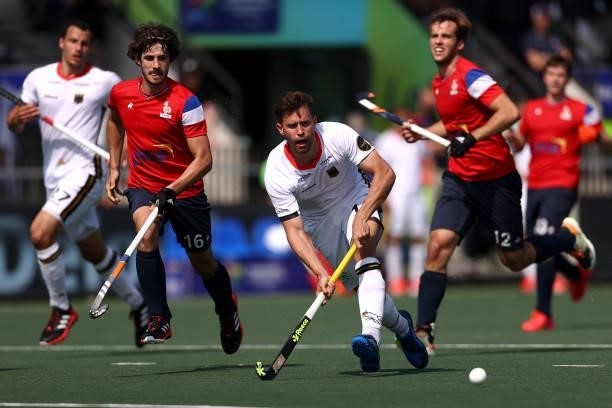 Timm Herzbruch of Germany battles for the ball with Francois Goyet and Amaury Bellenger of France during the Euro Hockey Championships Men match...