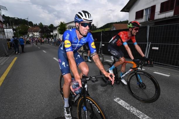 Mattia Cattaneo of Italy and Team Deceuninck - Quick-Step & Wouter Poels of Netherlands and Team Bahrain Victorious at arrival during the 84th Tour...
