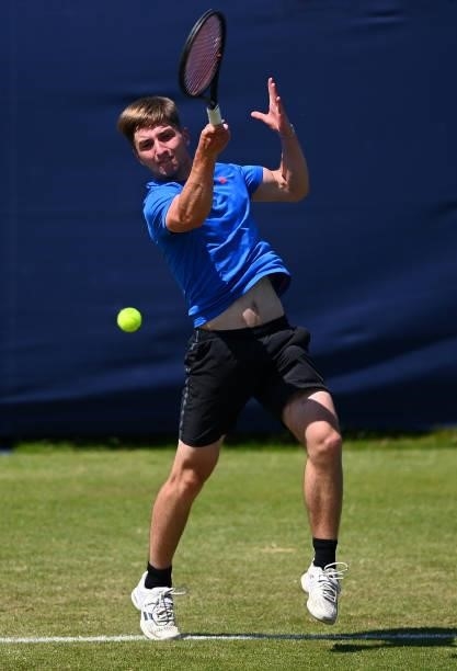 Alexander Knox-Jones hits a forehand during his match against William Nolan during the Junior National Tennis Championships at Surbiton Racket &...