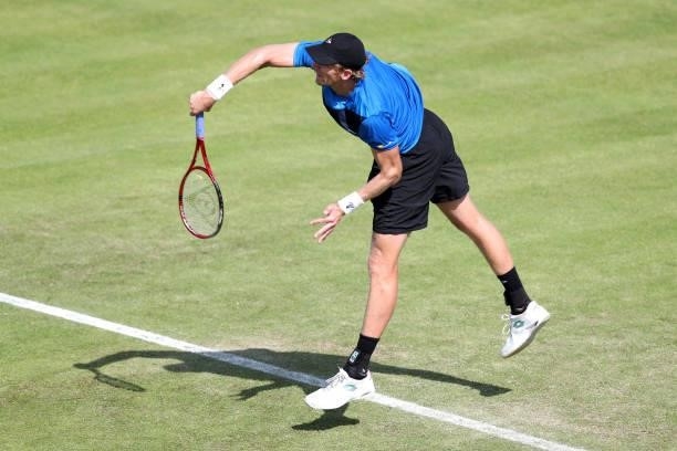 Kevin Anderson of South Africa serves against Jay Clarke of Great Britain during Day 4 of the Viking Nottingham Open at Nottingham Tennis Centre on...
