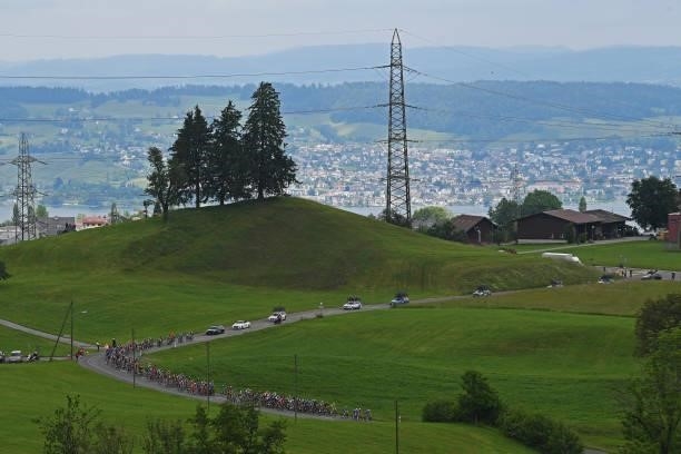 The Peloton passing through Hüttnerstrasse during the 84th Tour de Suisse 2021, Stage 3 a 185km stage from Lachen to Pfaffnau 509m / Landscape /...