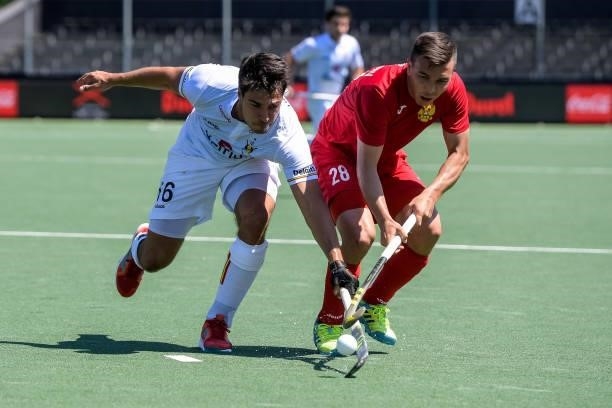 Alexander Hendrickx of Belgium and Ilfat Zamalutdinov of Russia battle for possession during the Euro Hockey Championships match between Belgium and...