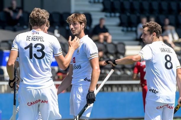 Antoine Kina of Belgium celebrates with Nicolas de Kerpel of Belgium after scoring his sides fifth goal during the Euro Hockey Championships match...