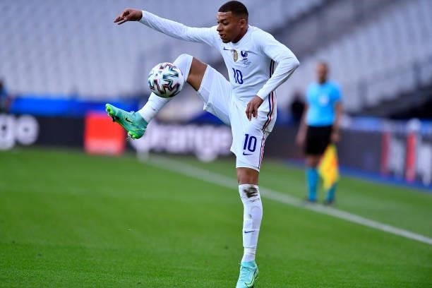 Kylian Mbappe of France controls the ball during the international friendly match between France and Bulgaria at Stade de France on June 08, 2021 in...