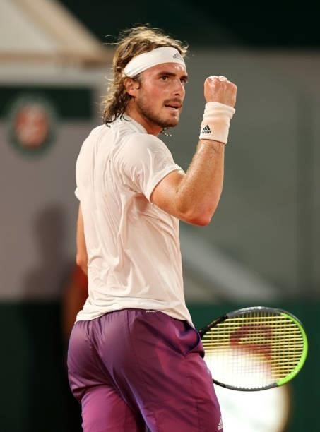 Stefanos Tsitsipas of Greece celebrates in their mens singles quarter final match against Daniil Medvedev of Russia during day ten of the 2021 French...