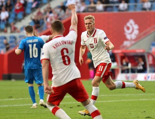 Karol Swiderski of Poland scores his team's second goal during the international friendly match between Poland and Iceland at Stadion Poznan on June...