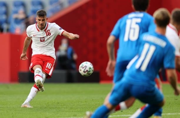 Jakub Moder of Poland takes a shot during the international friendly match between Poland and Iceland at Stadion Poznan on June 08, 2021 in Poznan,...