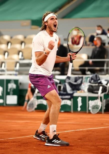 Stefanos Tsitsipas of Greece celebrates match point in their mens singles quarter final match against Daniil Medvedev of Russia during day ten of the...