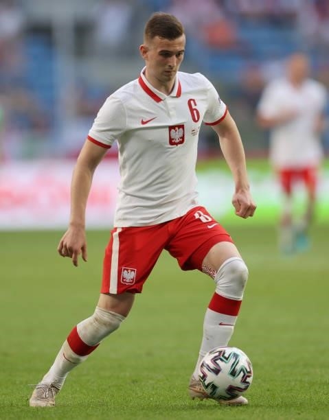Kacper Kozlowski of Poland runs with the ball during the international friendly match between Poland and Iceland at Stadion Poznan on June 08, 2021...