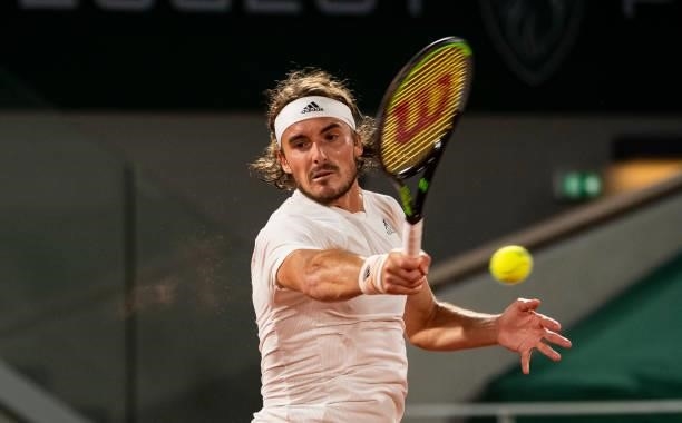 Stefanos Tsitsipas of Greece hits a forehand against Daniil Medvedev of Russia in the quarterfinals of the men's singles at Roland Garros on June 08,...