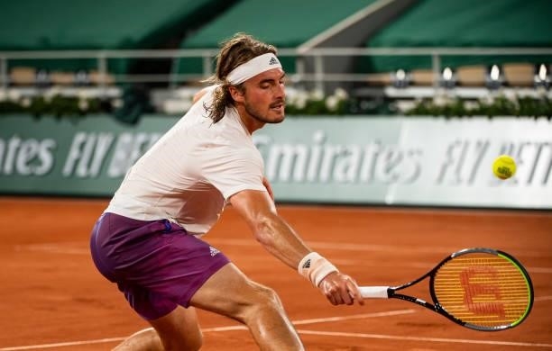 Stefanos Tsitsipas of Greece hits a forehand against Daniil Medvedev of Russia in the quarterfinals of the men's singles at Roland Garros on June 08,...