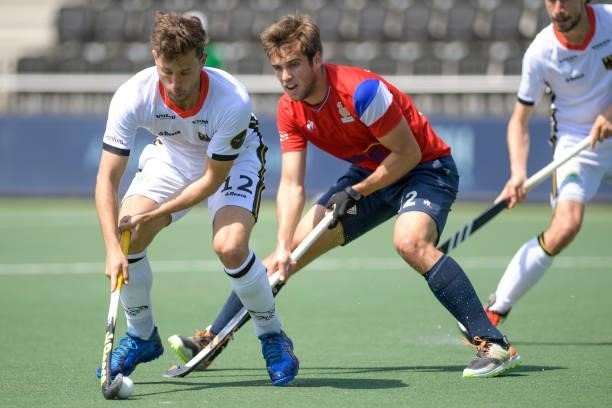 Timm Herzbruch of Germany and Amaury Bellenger of France during the Euro Hockey Championships match between France and Germany at Wagener Stadion on...