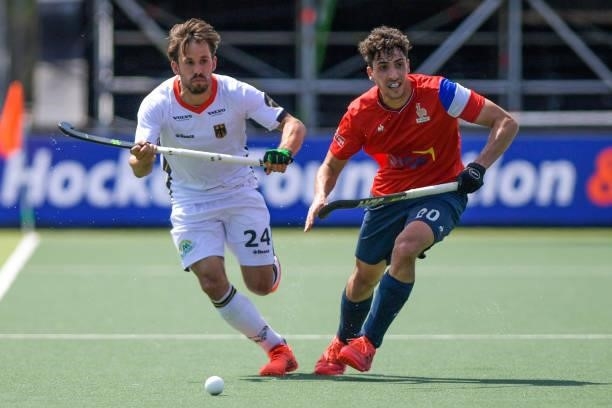 Benedikt Furk of Germany and Eliot Curty of France during the Euro Hockey Championships match between France and Germany at Wagener Stadion on June...