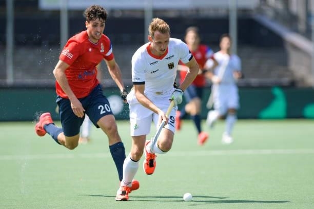 Eliot Curty of France and Niklas Wellen of Germany during the Euro Hockey Championships match between France and Germany at Wagener Stadion on June...