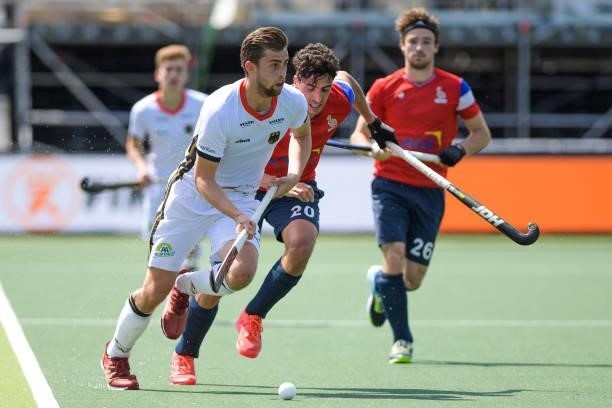 Constantin Staib of Germany battles for possession with Eliot Curty of France during the Euro Hockey Championships match between France and Germany...