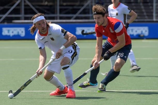 Martin Zwicker of Germany and Antonin Igau of France during the Euro Hockey Championships match between France and Germany at Wagener Stadion on June...