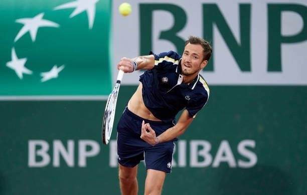 Daniil Medvedev of Russia serves in his Quarter Final match against Stefanos Tsitsipas of Greece during day ten of the 2021 French Open at Roland...