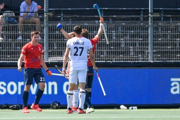 Benjamin Marque of France celebrates after scoring his sides fifth goal with Blaise Rogeau of France during the Euro Hockey Championships match...