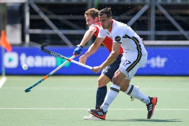 Blaise Rogeau of France and Timur Oruz of Germany during the Euro Hockey Championships match between France and Germany at Wagener Stadion on June 8,...