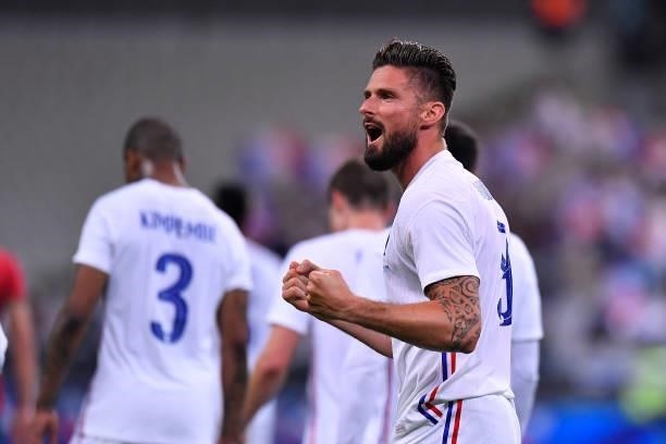 Olivier Giroud of France reacts after scoring during the international friendly match between France and Bulgaria at Stade de France on June 08, 2021...