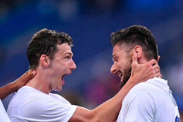 Olivier Giroud of France is congratulated by Benjamin Pavard after scoring during the international friendly match between France and Bulgaria at...